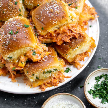 Chicken Enchilada Sliders on a serving platter.