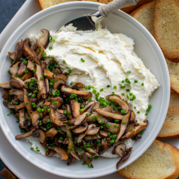 Whipped Camembert Butter with Mushrooms in a serving bowl.