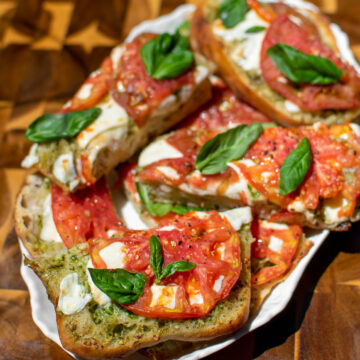 Pesto Caprese Garlic Bread on a serving platter.