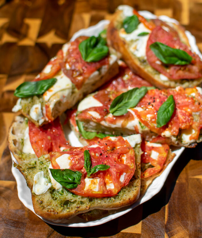 Pesto Caprese Garlic Bread on a serving platter.