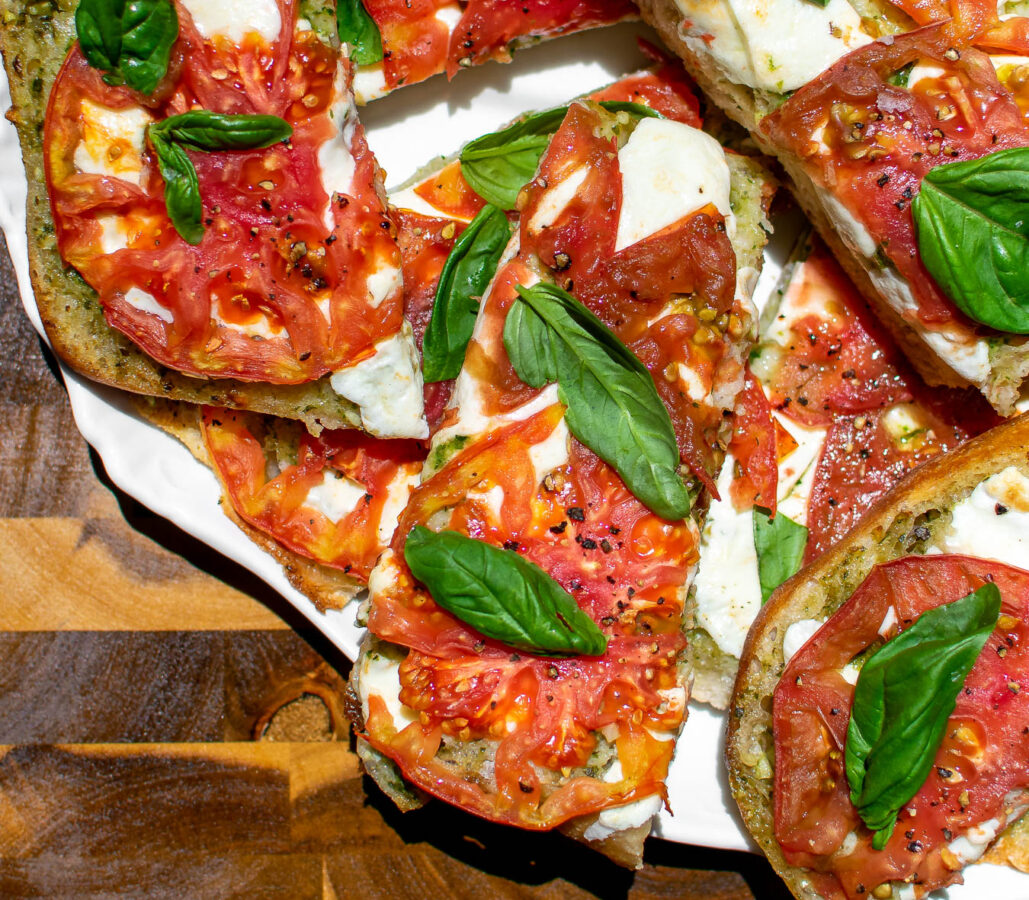 Pesto Caprese Garlic Bread close up.