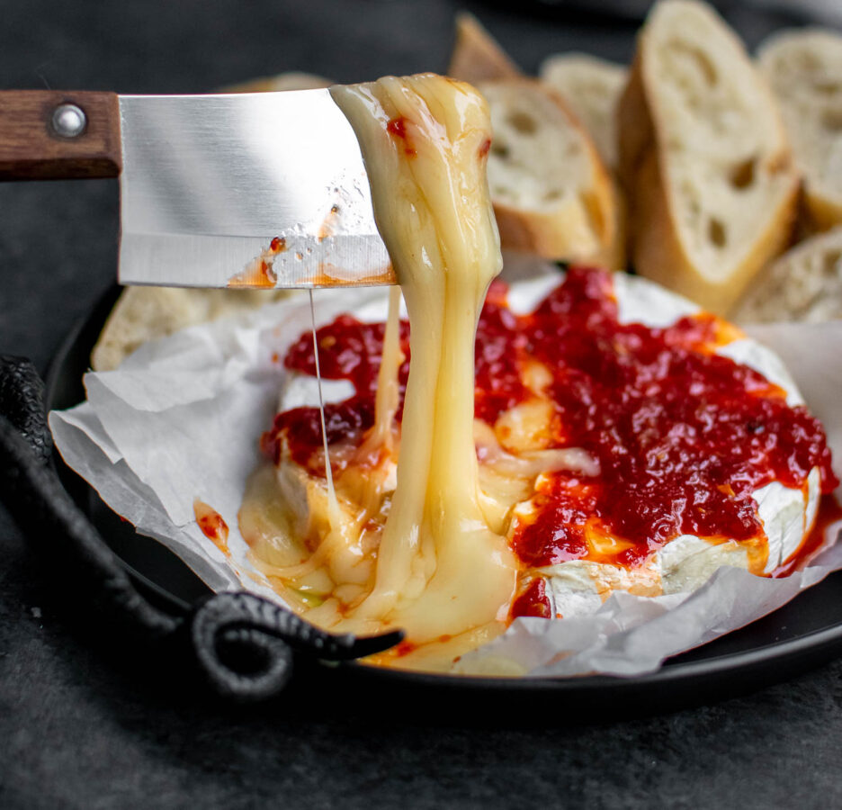 Bloody Baked Brie cheese pull.