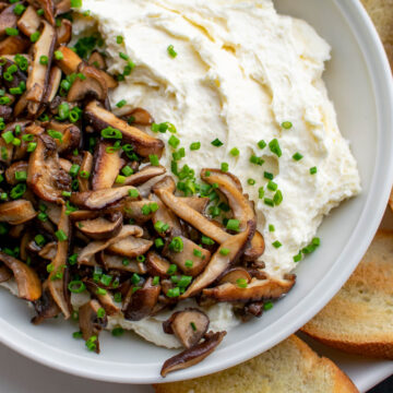 Whipped Camembert Butter with Mushrooms in a serving bowl.